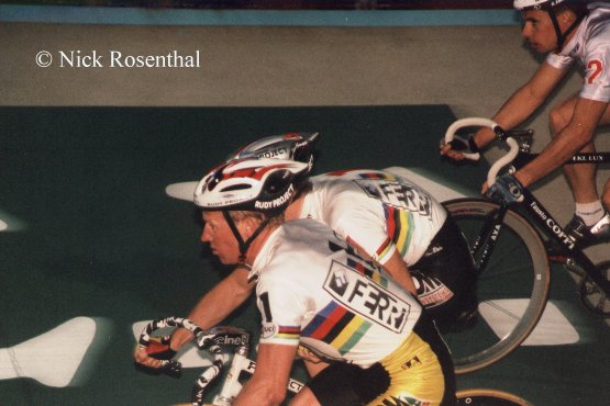 A madison change: Etienne de Wilde and Matt Gilmore in close-up bike racing action on the track